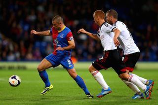 Kevin Phillips (left) on the ball for Crystal Palace against Fulham in the Premier League in October 2013.