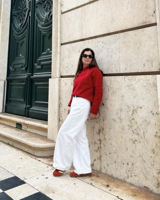 @mcristinastyling wearing red trainers