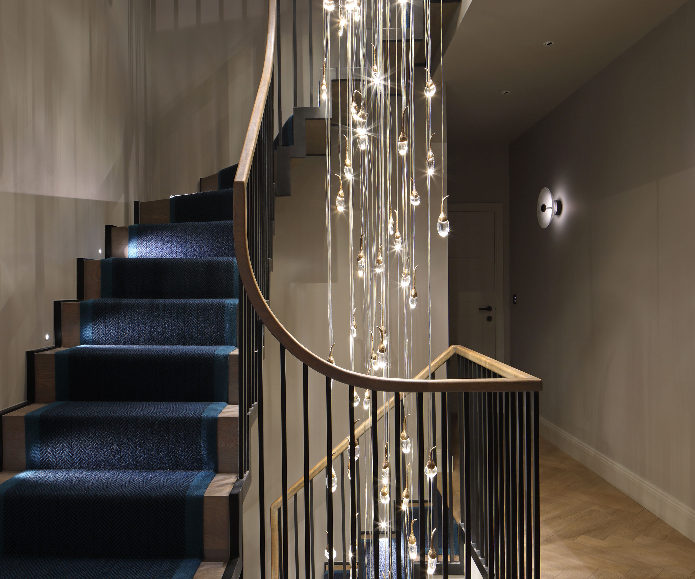 staircase with modern cascade of lights