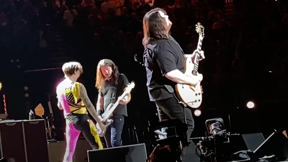 [L-R] Justin Hawkins, Dave Grohl and Wolfgang Van Halen