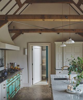 Rustic cream kitchen with island and marble countertops