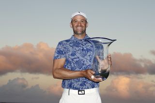 Ben Silverman holds the trophy after winning on the Korn Ferry Tour in the Bahamas