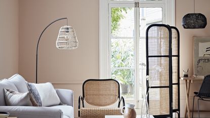 Escapism interiors trend, living room with rattan furniture from Habitat