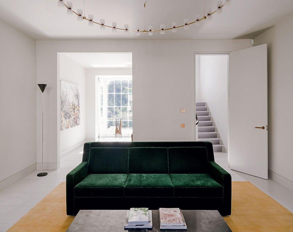 The six-level property features Carrara marble and restored timer flooring.