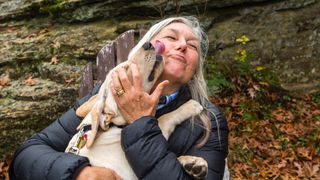 Labrador licking woman&#039;s face