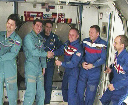 New Space Station Crew Takes Charge