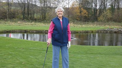 93-year-old Marjorie Curtin smiles after winning Carus Green Golf Club's medal competition