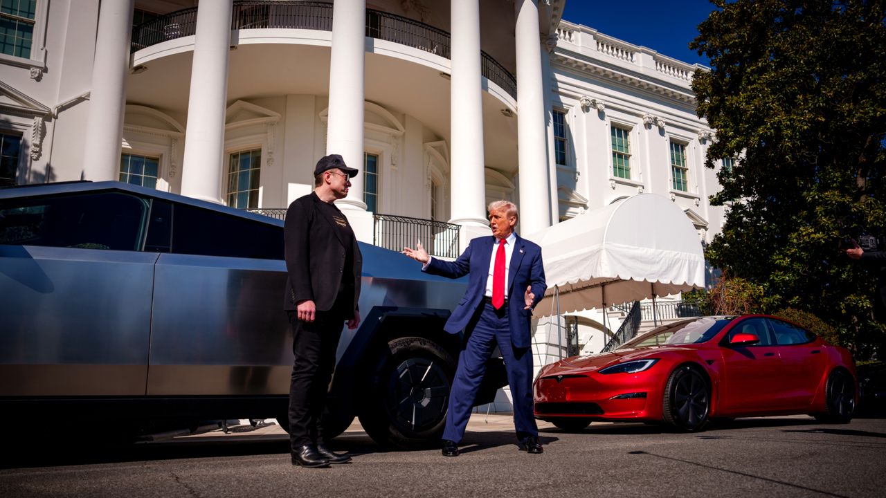 Elon Musk and President Donald Trump admire a Tesla Cybertruck outside the White House