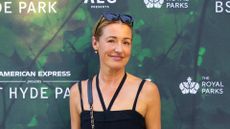 Cat Deeley is pictured with her hair up and sunglasses on her head at BST Hyde Park 2026 at Hyde Park on July 12, 2026 in London, England.