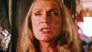 Terence Stamp as Bernadette mid-speech