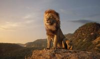 Best CGI creature design; a lion stands on a rock in the sun