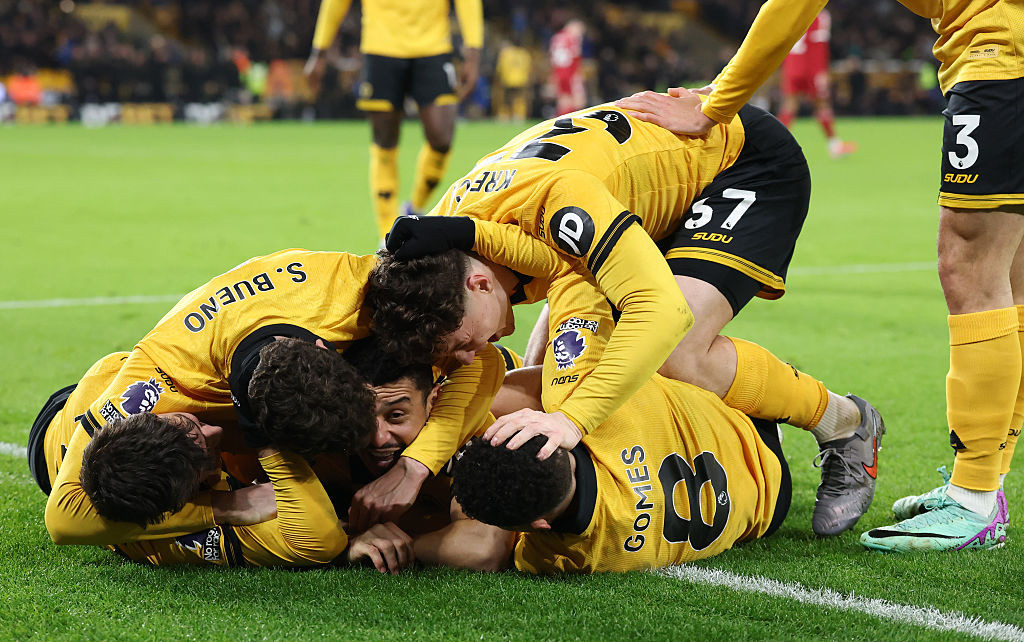 Players of Wolverhampton Wanderers celebrate after Andre scores his team's second goal during the Premier League match between Wolverhampton Wanderers and Liverpool at Molineux on March 03, 2026 in Wolverhampton, England.