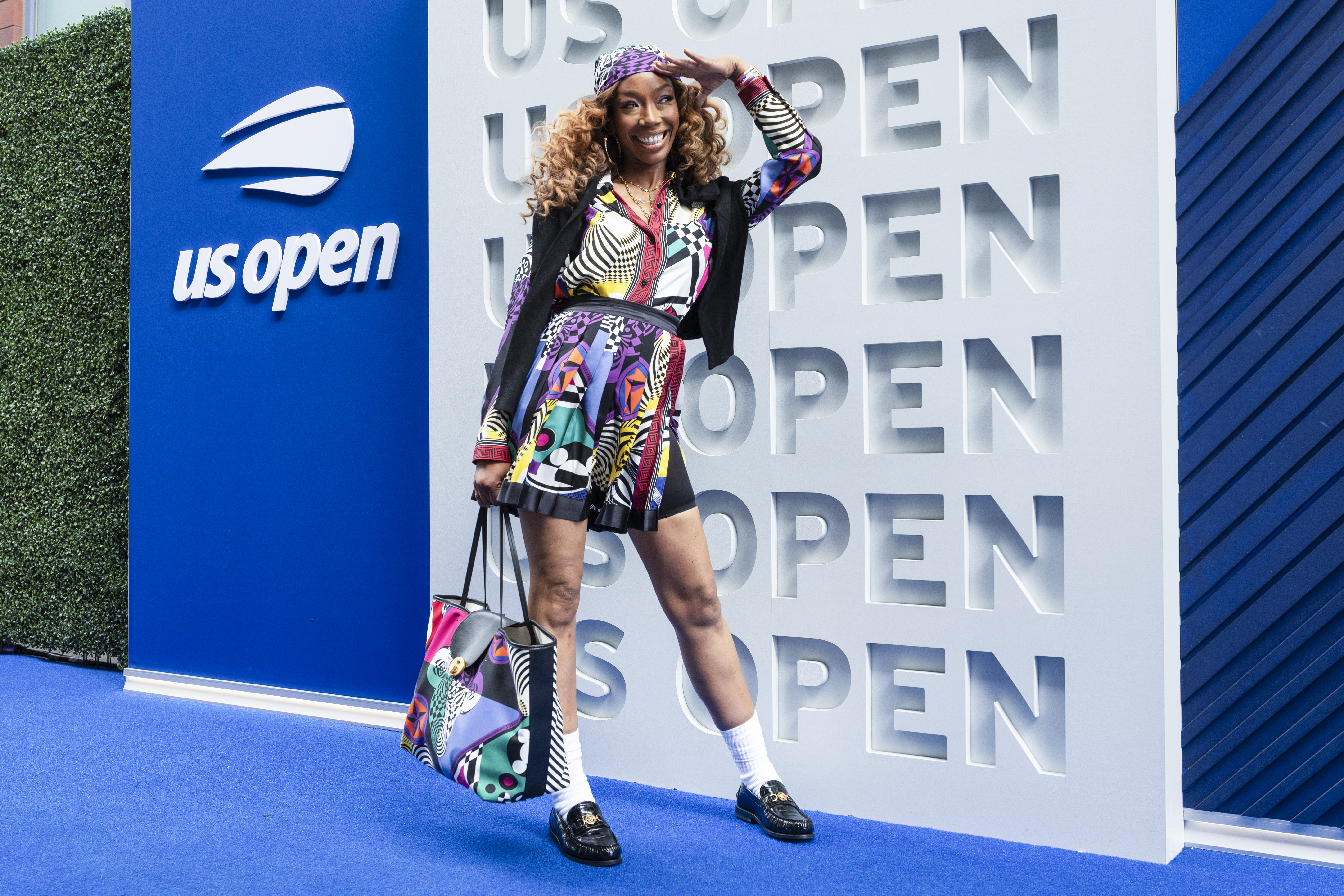 Brandy attended the 2026 US open in a multicolor '90s-inspired look