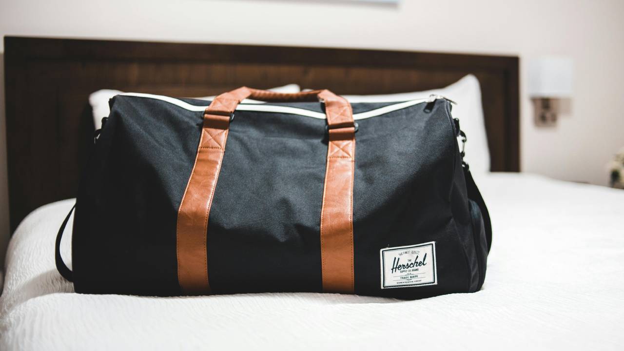 Suitcase on bed