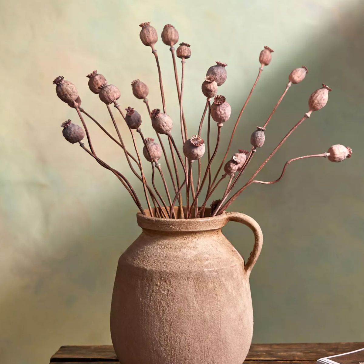A vase with dried flowers in 