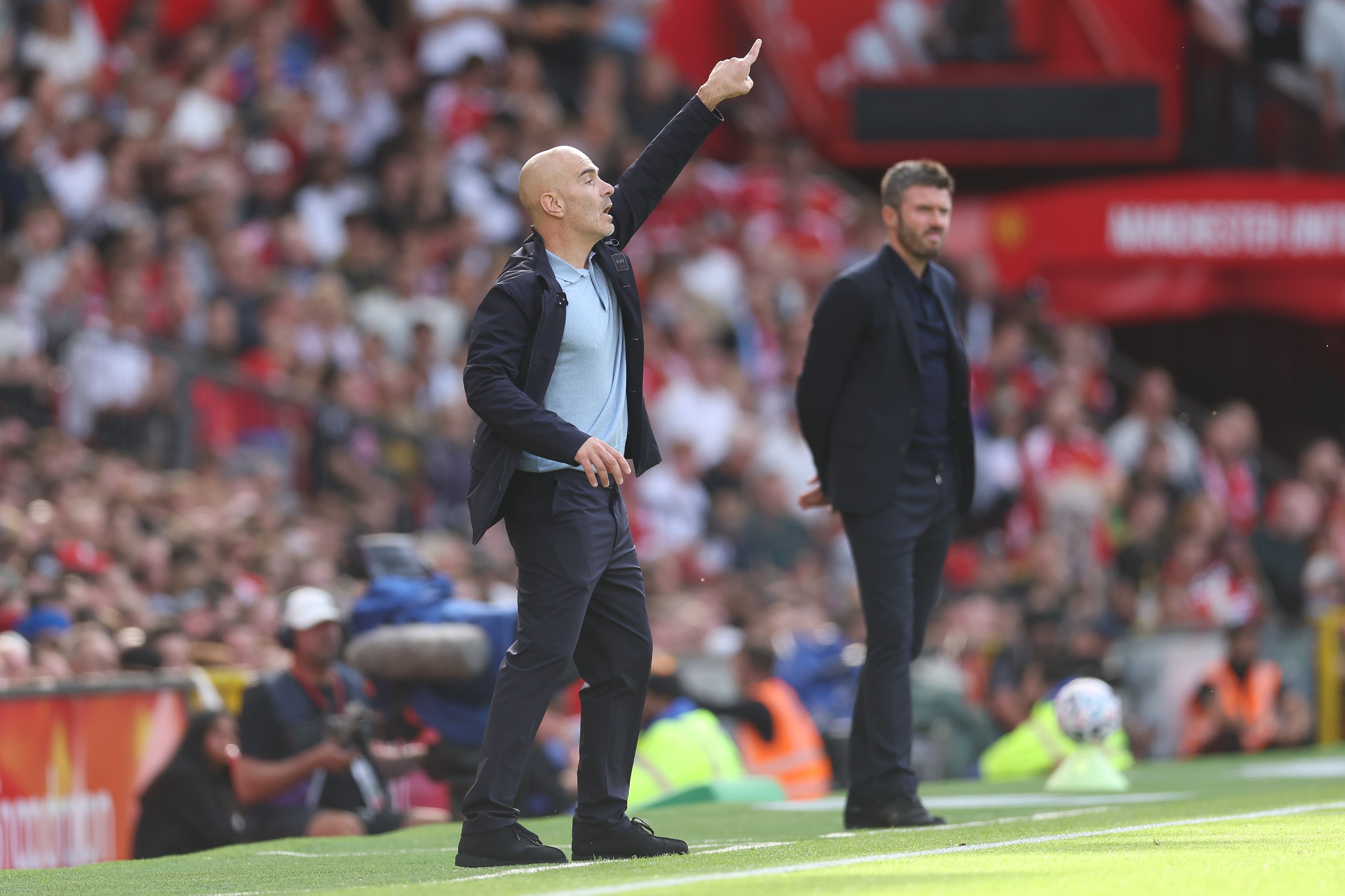 Enzo Maresca, head coach of Manchester City, issues instructions during the Premier League 2026/27 match between Manchester United and Manchester City at Old Trafford on September 13, 2026 in Manchester, England.