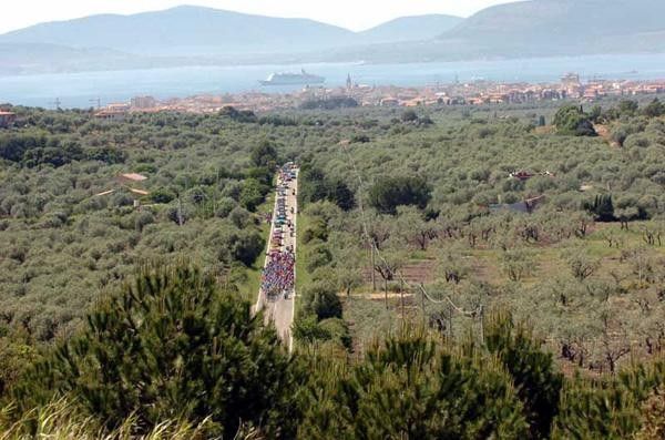 The peloton goes across the island of Sardinia.