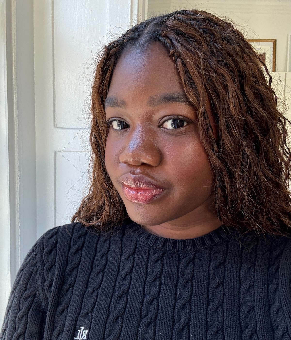 Associate beauty editor Maya Thomas wearing Sacheu lip tint.