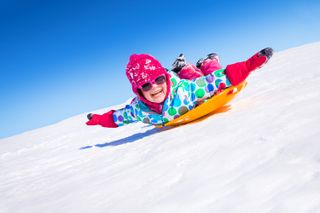 Girl playing in snow