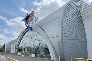 As seen in March 2022, the exterior of the former Fry's Electronics in Webster, Texas, resembled space station modules.