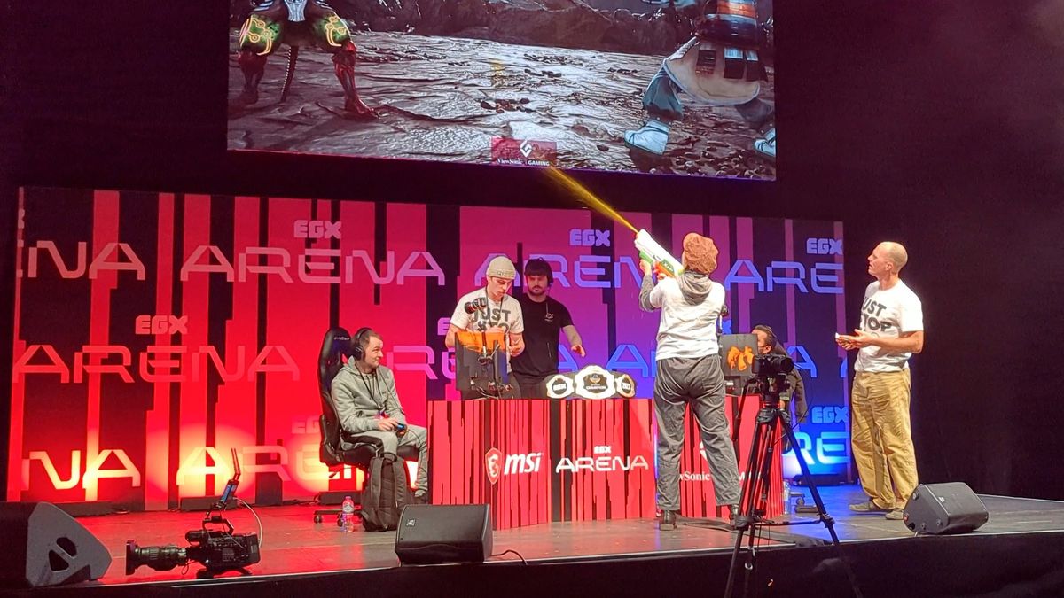 Just Stop Oil activists seen disrupting the Tekken 7 winners final tournament during EGX 2023.