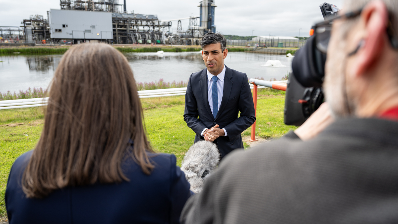 Rishi Sunak speaks to reporters in front of a gas plant in Peterhead