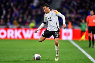 Jamal Musiala of Germany controls the ball during the international friendly match between France and Germany at Groupama Stadium on March 23, 2024 in Lyon, France. (Photo by Franco Arland/Getty Images) Germany Euro 2024 squad