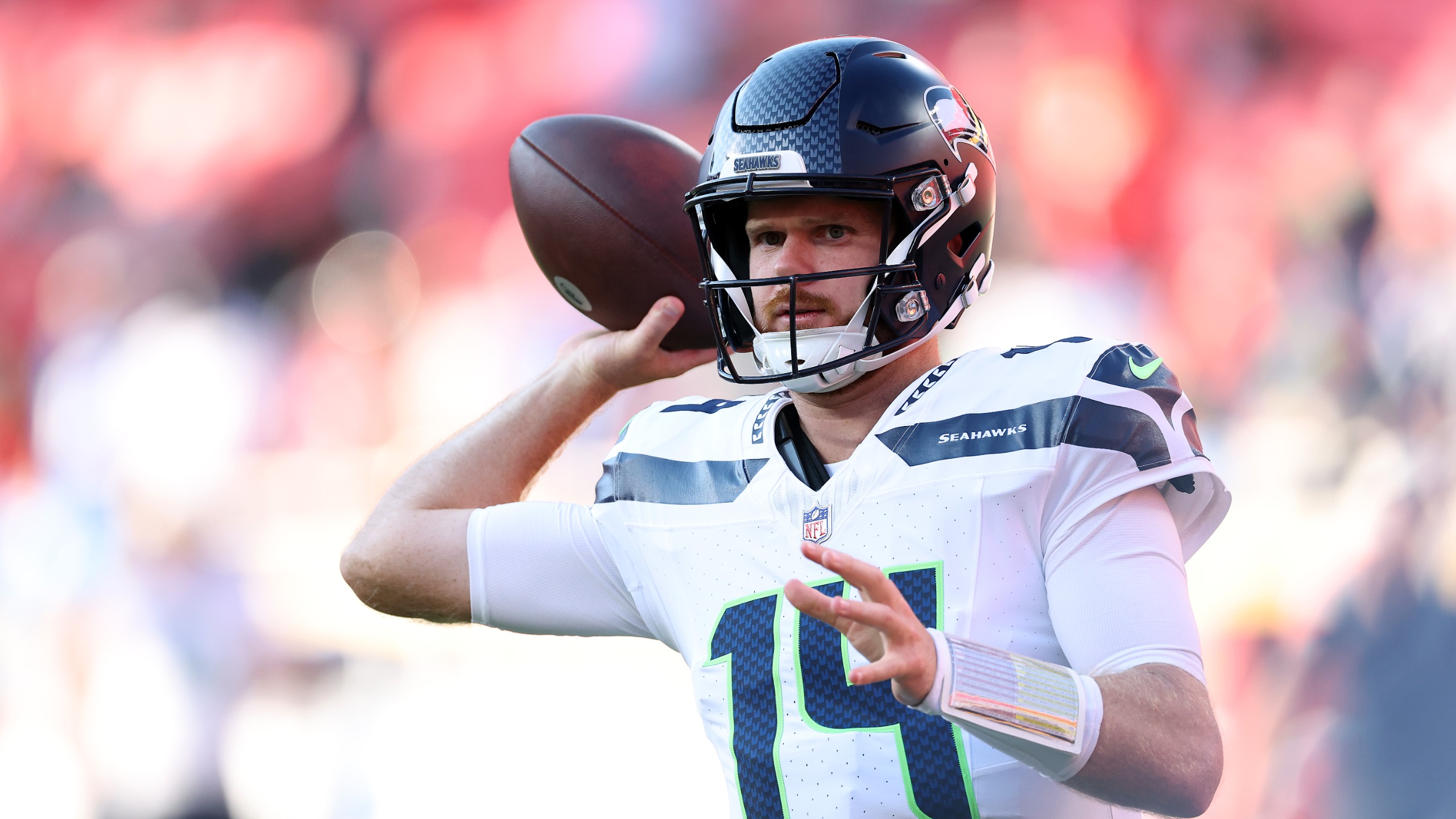 Quarterback Sam Darnold #14 of the Seattle Seahawks warms up prior to the preseason game against the Kansas City Chiefs at Arrowhead Stadium