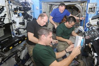 Expedition 38 Crew Take Part in Emergency Drill