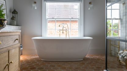 bathroom with terracotta honeycomb flooring
