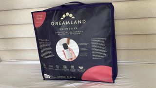 Dreamland Snowed In Organic Cotton Electric Blanket bag on the bed