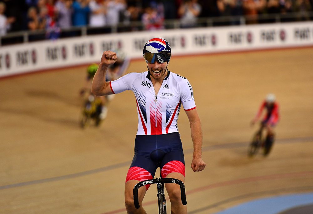Jonathan Dibben of Great Britain celebrates after winning the final of the Mens Points Race