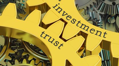 Investment trust concept on gearwheels