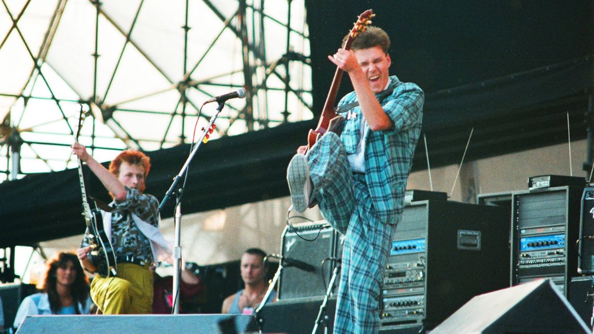  Bruce Watson and Stuart Adamson of Big Country perform live on stage at Knebworth Park in Hertfordshire, United Kingdom on June 9, 1986