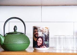 Photo of happy couple printed on a mug
