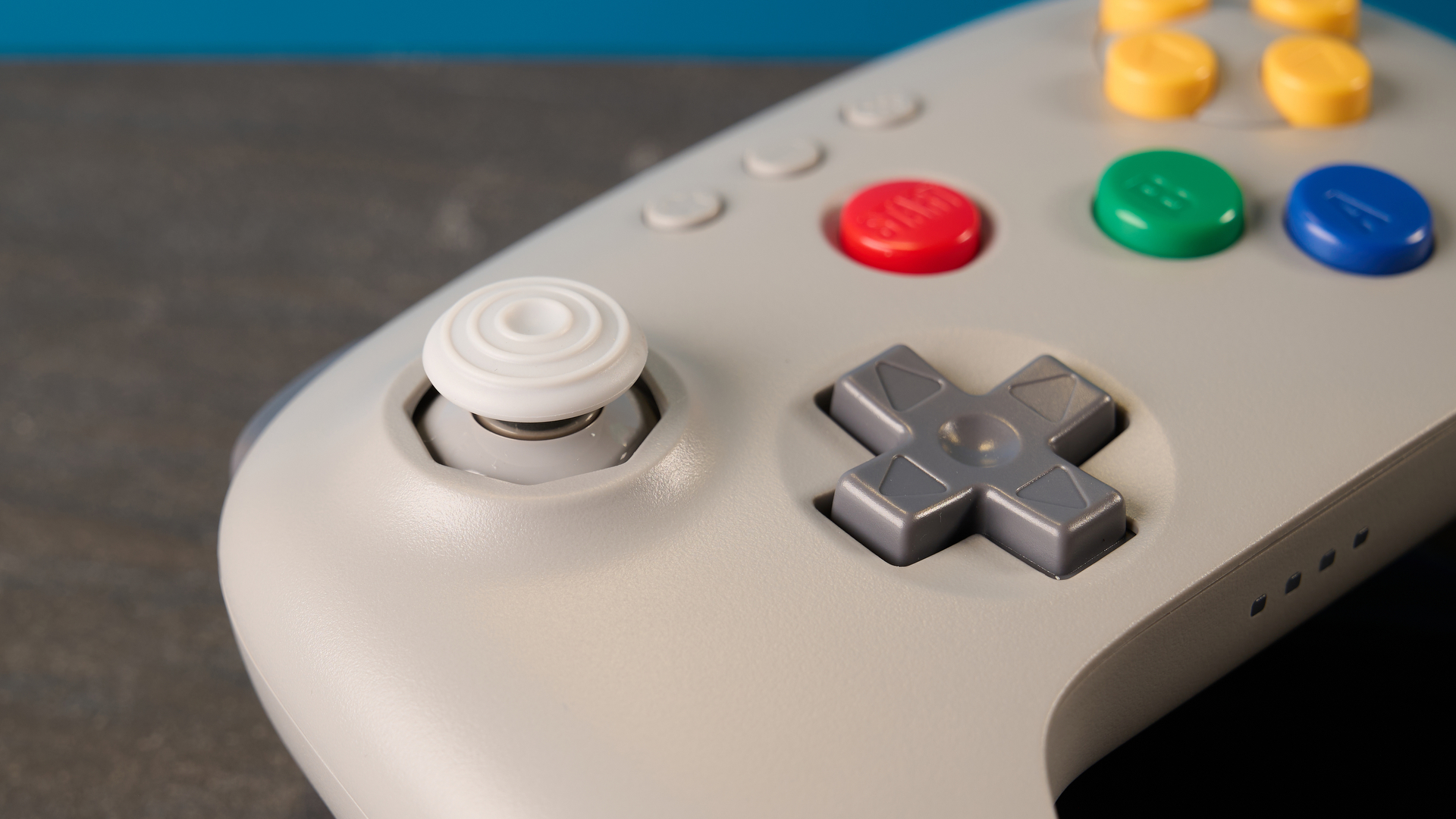The 8BitDo 64 Controller on a wooden surface