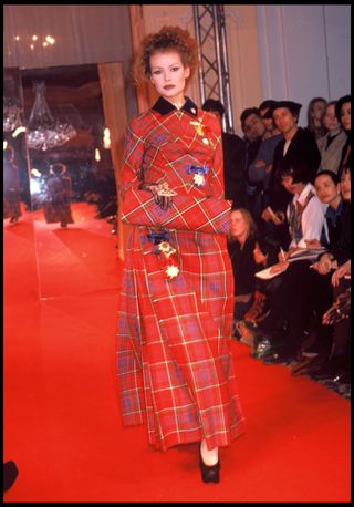 Woman in tartan on Vivienne Westwood runway