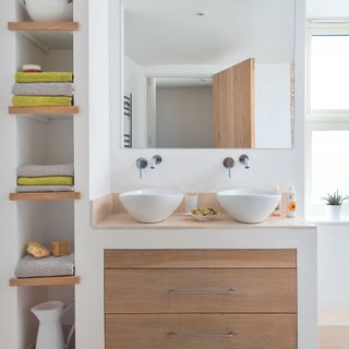 Bathroom sink storage unit with built in shelves
