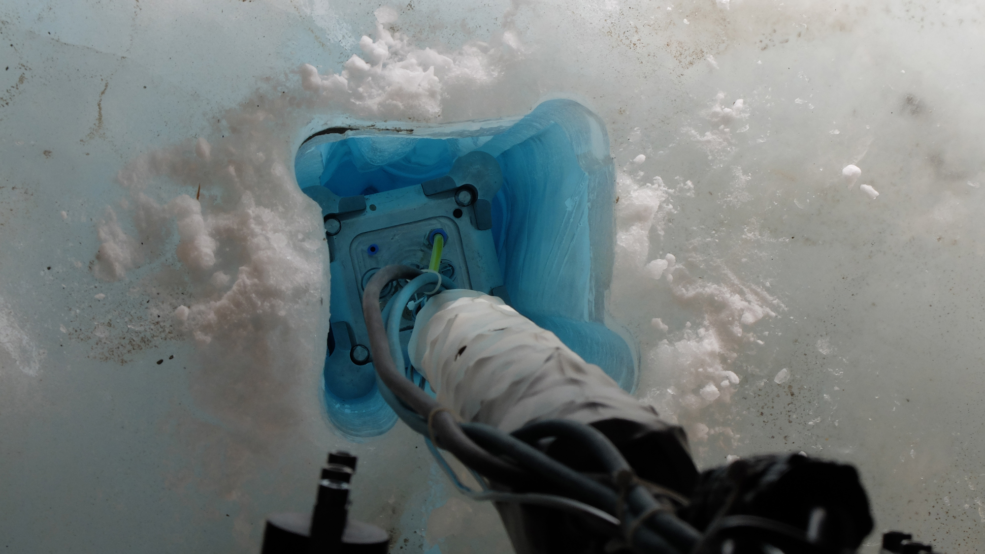 The IceMole drill prototype melts into the Blood Falls glacier in Anarctica during a test of technology for a mission to explore Saturn&#039;s icy moon Enceladus. The drill collected an uncontaminated water sample from inside the glacier.