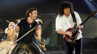 Queen’s Brian May and Paul Rodgers performing onstage in the late 2000s