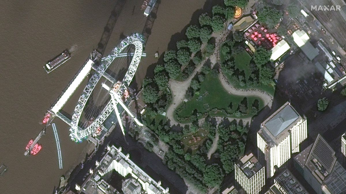A satellite image taken by Maxar Technologies showing a large crowd waiting to view Queen Elizabeth II's body lying in state.