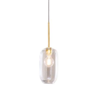 A hanging pendant light with a bright gold base and a curved glass lampshade with a lit bulb in it