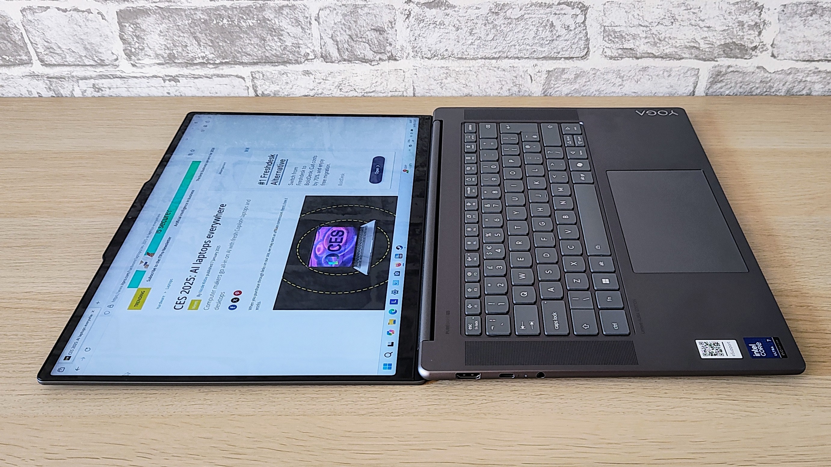 The Lenovo Yoga Slim i7 Gen 9 Aura Edition on a desk