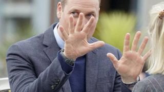 Prince William wearing two watches