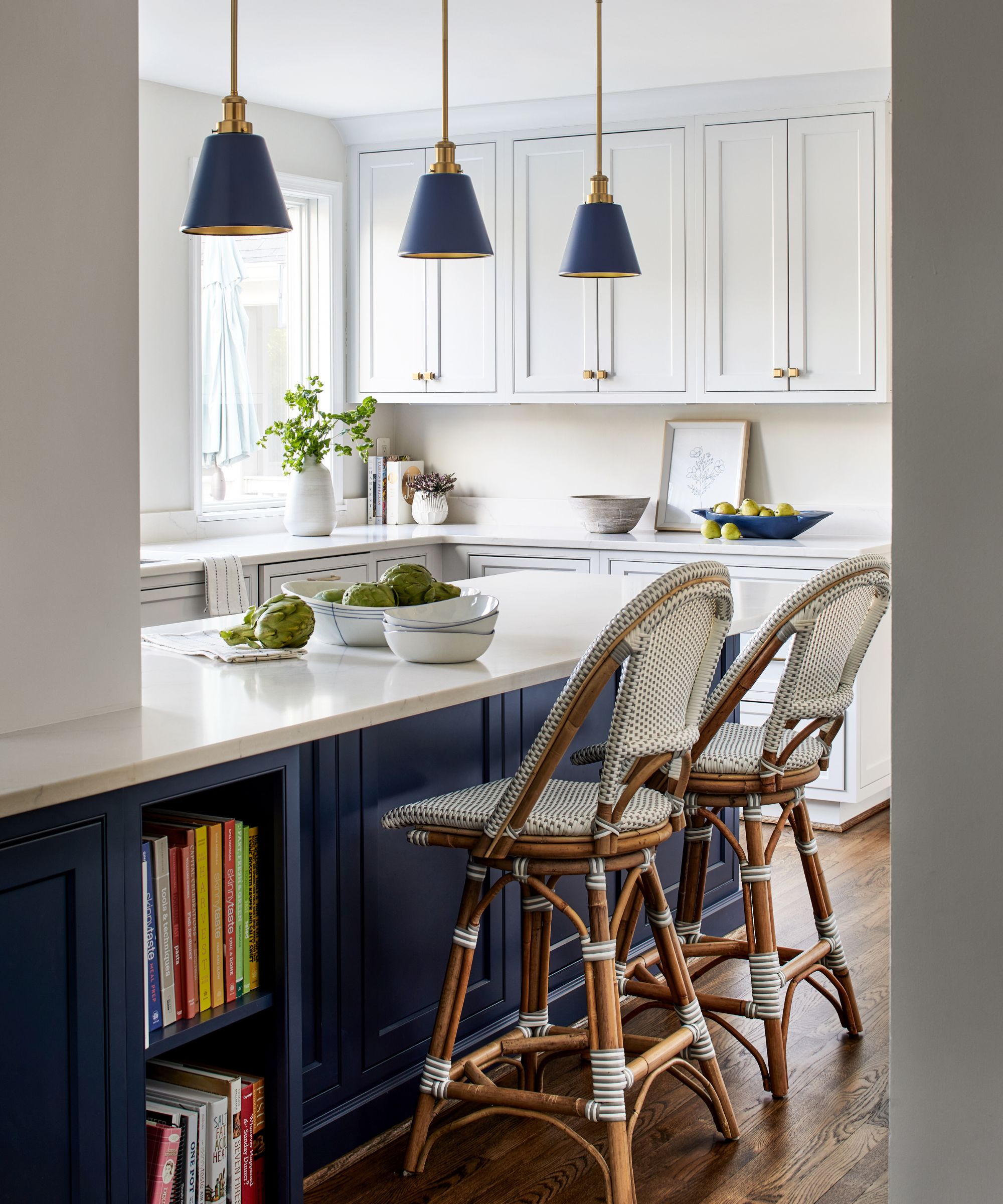 Kitchen with breakfast bar and bar stools by InSite Builders & Remodeling, photograph Stacy Zarin Goldberg