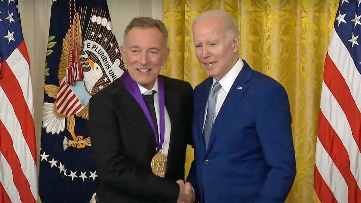 Bruce Springsteen and President Joe Biden shaking hands