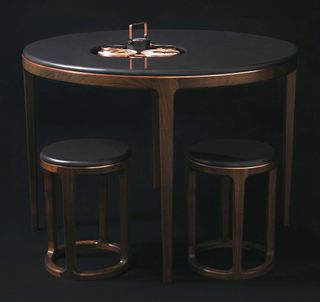 Tea set, table and stools.