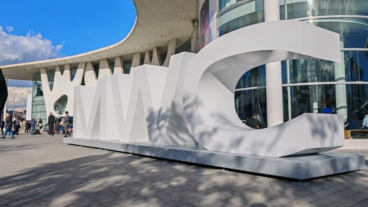 The &quot;MWC&quot; sign outside of a building