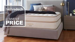 A Saatva Classic mattress in a bedroom with a badge saying "LOWEST PRICE"