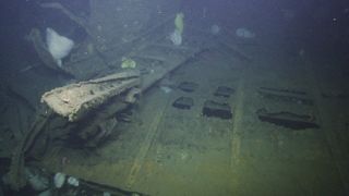 Researchers dive to the wreck of the WW II-era aircraft, the USS Independence.